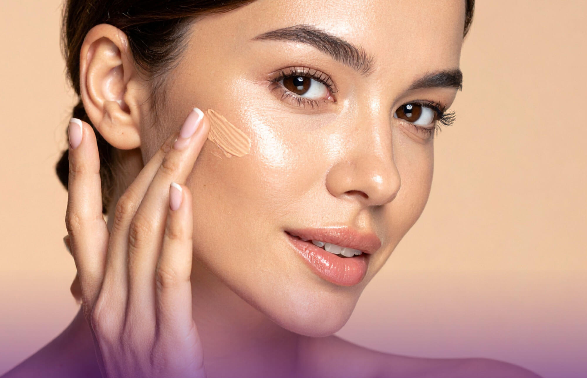 Women applying cream to face - blog image